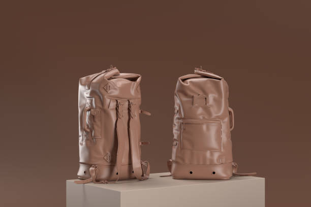 istock Two backpacks are shown in a tan color 2189557681
