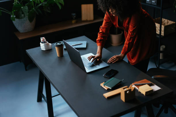 istock Young manager working on a laptop in her modern office 2189558085