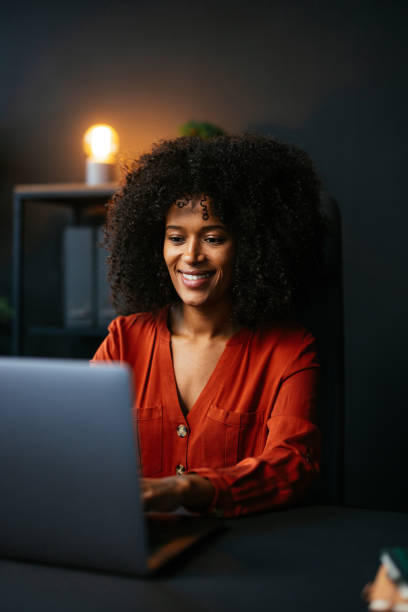 istock Young businesswoman working on laptop in modern office 2189558104