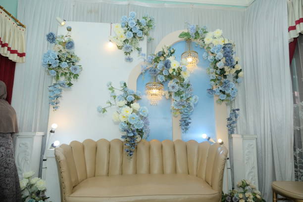 istock Elegant Beige Sofa in a Blue and White Floral Decor Setting 2189558899
