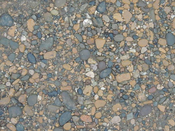 istock Pebbles on the river bank close-up 2189559078