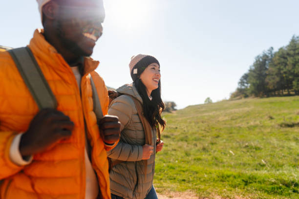 istock Smiling friends hiking together 2189567012
