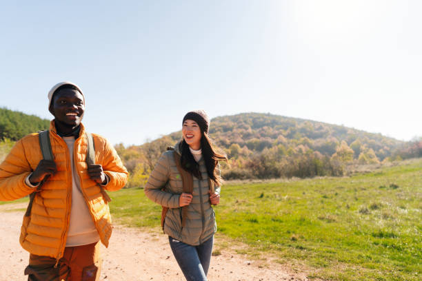 istock Smiling friends hiking together 2189567025