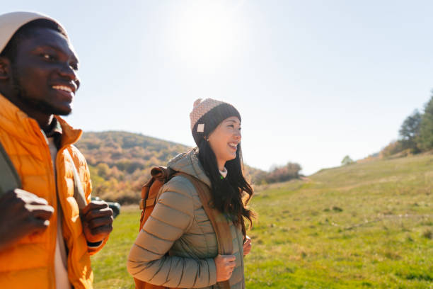 istock Smiling friends hiking together 2189567028
