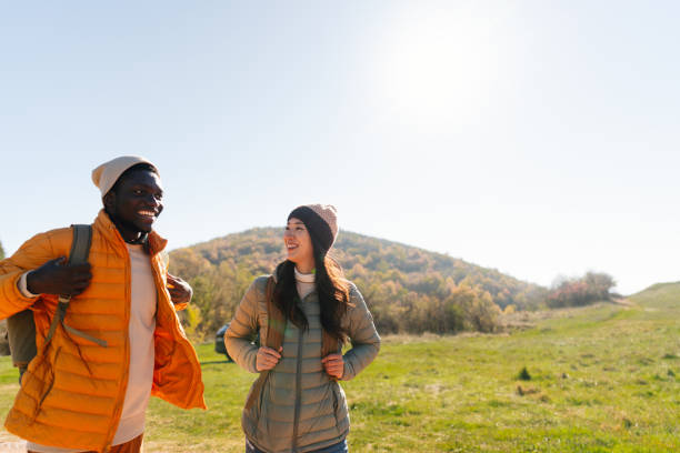 istock Smiling friends hiking together 2189567076