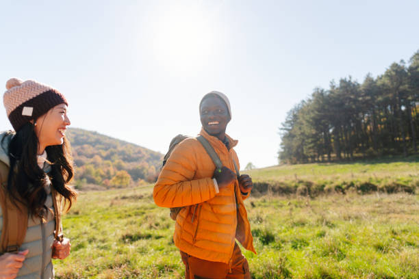 istock Smiling friends hiking together 2189567081