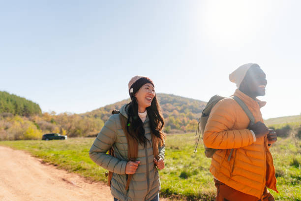 istock Smiling friends hiking together 2189567085