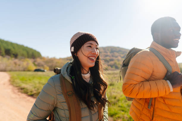 istock Smiling friends hiking together 2189567118