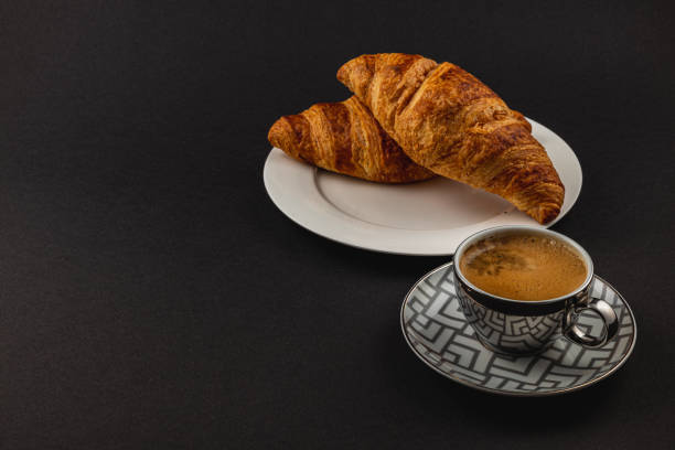 buttery croissants and rich espresso, a delightful pairing perfect for breakfast