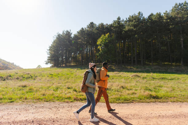 istock Smiling friends hiking together 2189567158