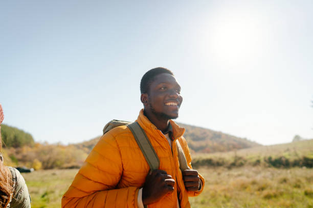 istock Smiling friends hiking together 2189567159
