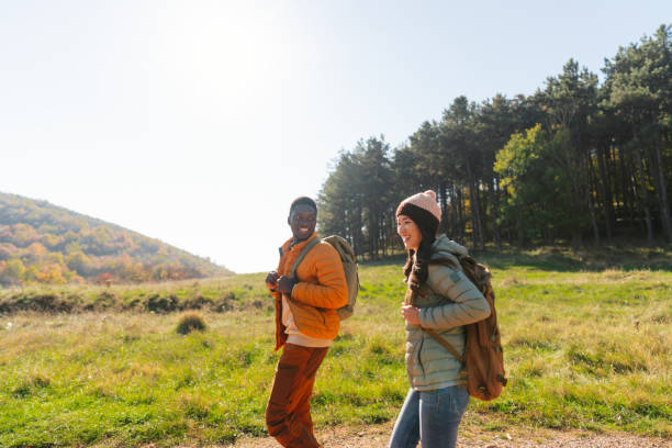 istock Smiling friends hiking together 2189567184