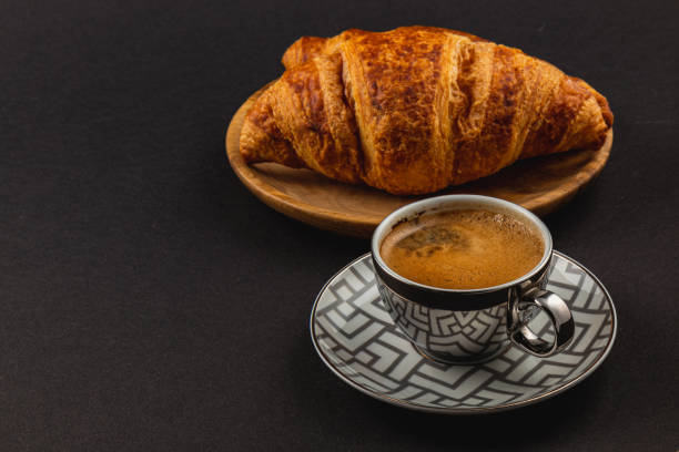 buttery croissants and rich espresso, a delightful pairing perfect for breakfast