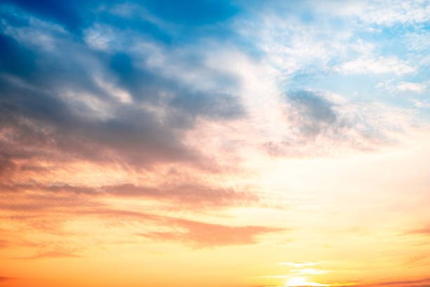 istock Sky,sunset, beautiful , luxury soft gradient orange gold clouds and sunlight on the blue sky perfect for the background, Sunrise on morning or everning in winter warm time ,Twilight summer,silhouette 2189569740