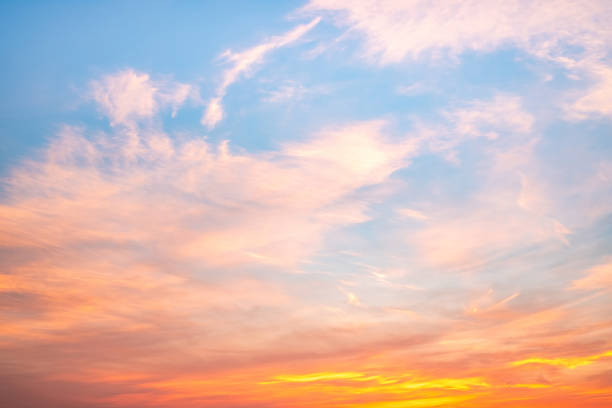istock Sky,sunset, beautiful , luxury soft gradient orange gold clouds and sunlight on the blue sky perfect for the background, Sunrise on morning or everning in winter warm time ,Twilight summer,silhouette 2189569770