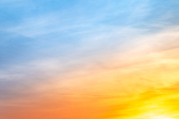 istock Sky,sunset, beautiful , luxury soft gradient orange gold clouds and sunlight on the blue sky perfect for the background, Sunrise on morning or everning in winter warm time ,Twilight summer,silhouette 2189569988