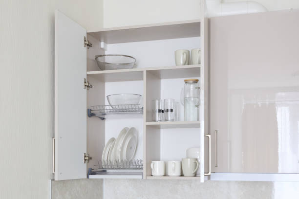 istock A Modern Kitchen Cabinet showcasing Organized Dinnerware and Glassware for Elegance 2189573334