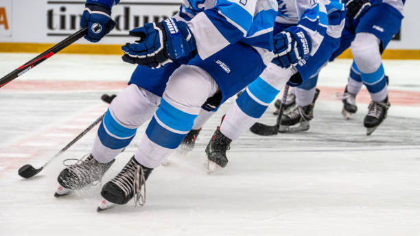istock Hockey Players Engage in Pre-Game Warm-Up Routine 2189573799