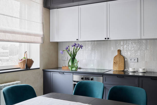 istock A beautifully designed modern kitchen interior adorned with flowers and elegant decor accents 2189573886