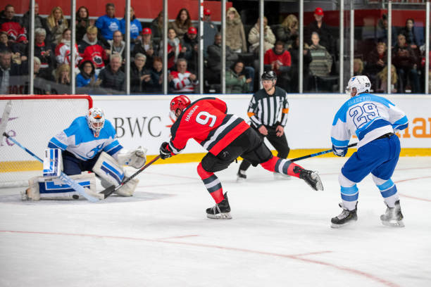 istock Ice Hockey Shot in Action 2189574918