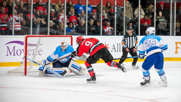 istock Hockey Player Executing a Powerful Shot on Goal 2189575101