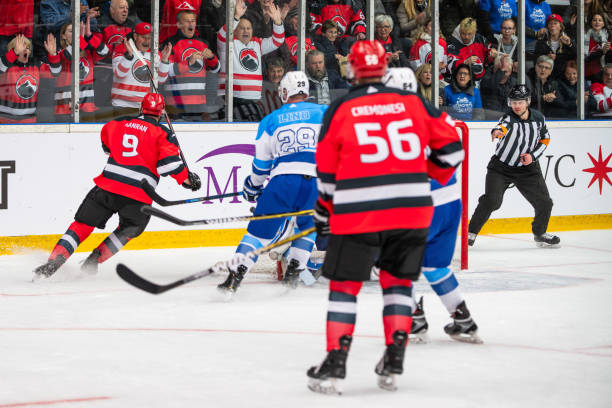 istock Intense Action at Professional Hockey Match 2189575104