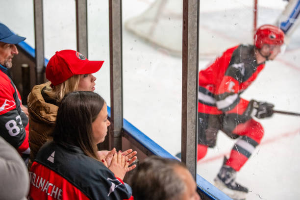 istock Engaged Hockey Fans at Live Game 2189575576
