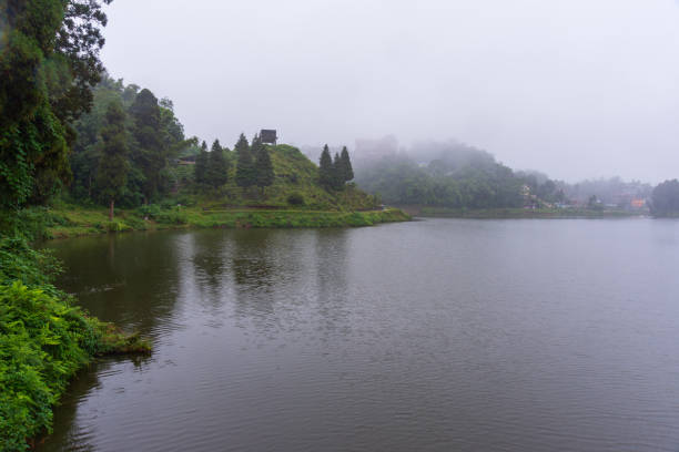 Approaching fog on Mirik Lake, West Bengal, India