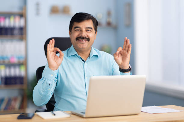 istock Businessman using laptop in office stock photo 2189578292