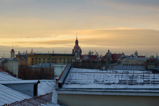 A stunning and beautiful skyline view showcasing charming rooftops and historical architecture during sunset hours