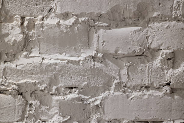 Textured White Brick Wall Background Ideal for Various Design Projects and Creative Endeavors