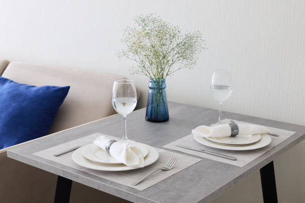 istock An Elegant Dining Setup Complete with a Beautifully Simple Floral Decoration Enhances the Experience 2189582040