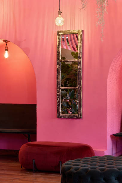 istock This charming pink interior showcases a stylish decor complemented by a beautiful mirror 2189582057