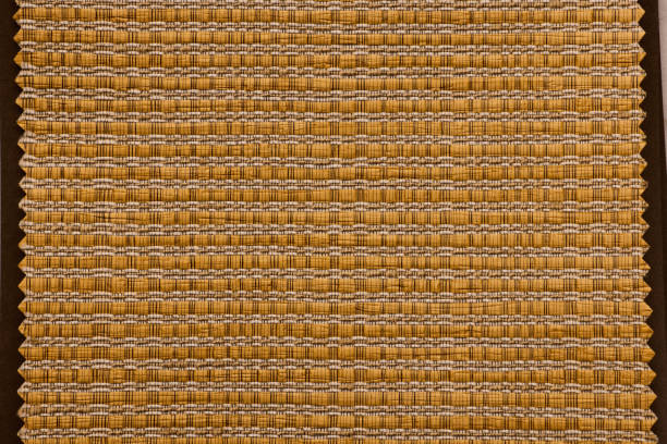 The beautifully textured weave pattern features warm earthy tones that create an inviting ambiance