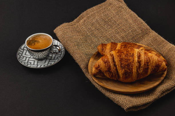 buttery croissants and rich espresso, a delightful pairing perfect for breakfast