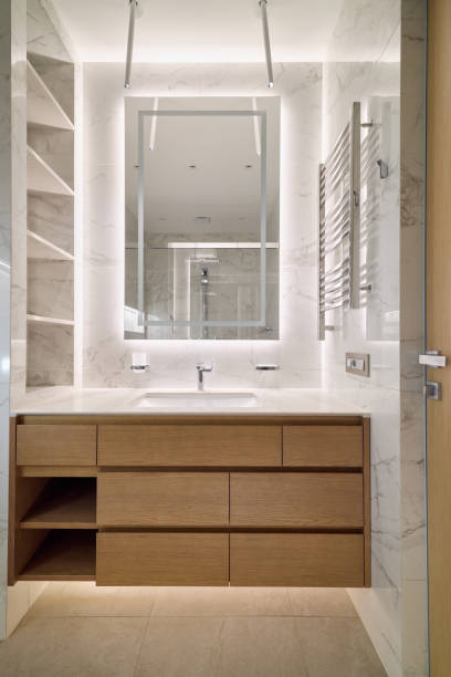 istock Discover a Modern Bathroom Design with Elegant Lighting and Smart Storage for style and function 2189582860
