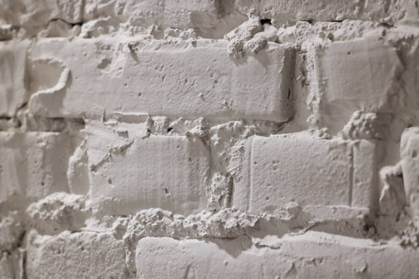 istock Closeup view of a beautifully Textured White Brick Wall showcasing its unique surface design 2189582861