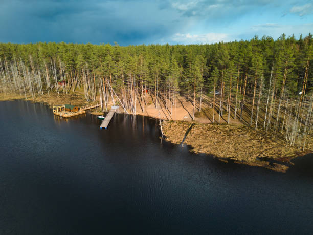 istock Experience a Serene Lakeside Retreat, beautifully surrounded by a lush forest area 2189584253