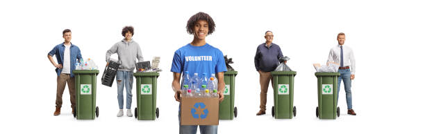 Multi-ethnic group of teenage girls sign up as a volunteer to help with recycling event.  School youth organization of volunteers.  High school age girls help with the \