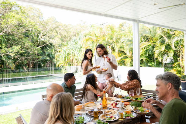 istock Multi-generation group enjoying barbecue lunch outdoors 2189594301