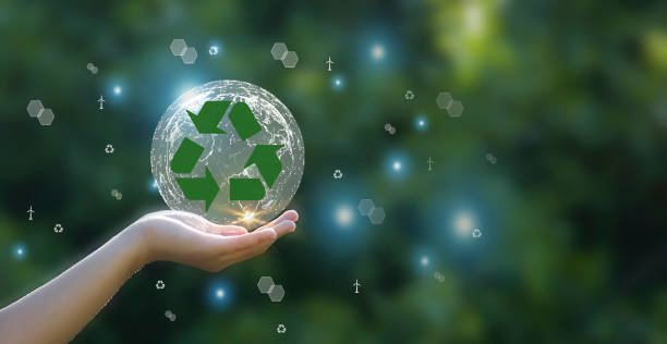 istock Recycle symbol on earth background The concept of maximizing resource utilization 2189594526