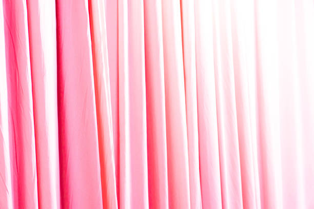 Cream cotton and red silk product background. Minimalist elegant texture