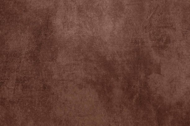 istock Velvety fabric texture with distressed details in Pantone 2025 Mocha Mousse color. 2189597969