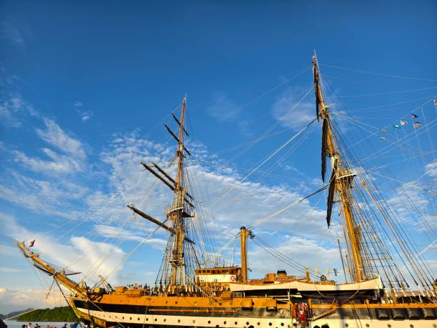 istock A large old ship at pier under a beautiful blue sky 2189600736
