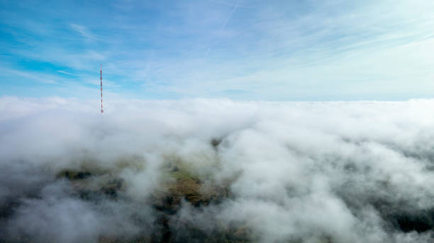 Fog and clouds over mountains and woodlands