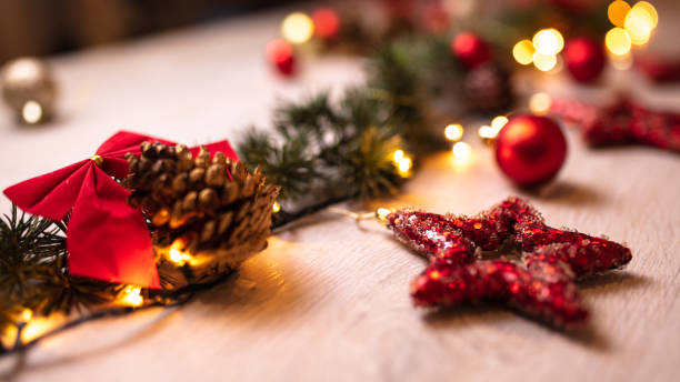 istock Festive Christmas Decorations Featuring Red Stars, Pine Cones, and Candy Canes 2189604162