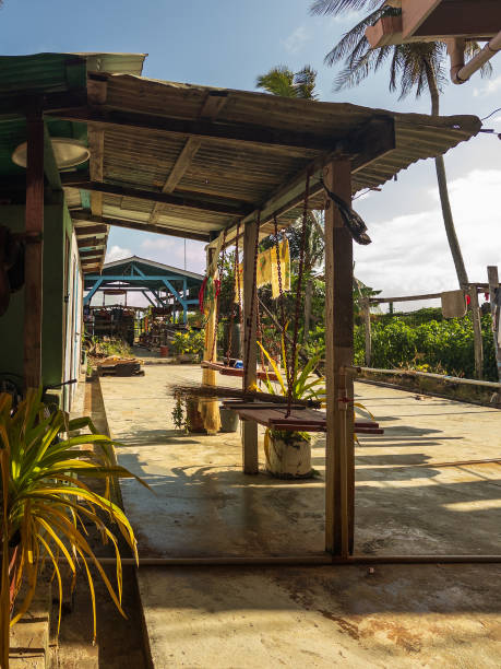istock Wooden Swing on a Concrete Patio 2189610602