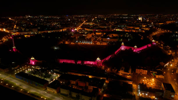 istock City at night with a pink wall 2189617667