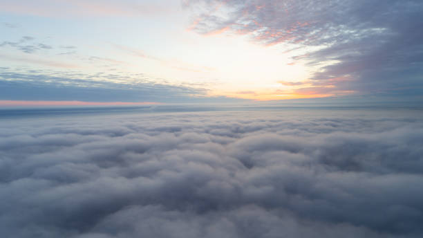 istock The sky is filled with clouds and the sun is setting 2189617818