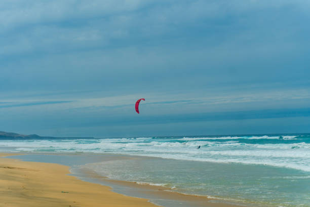 Amazing Playa de Cofete beach with endless horizon. Volcanic mountains and Atlantic Ocean. Cofete beach, Fuerteventura, Canary Islands, Spain.